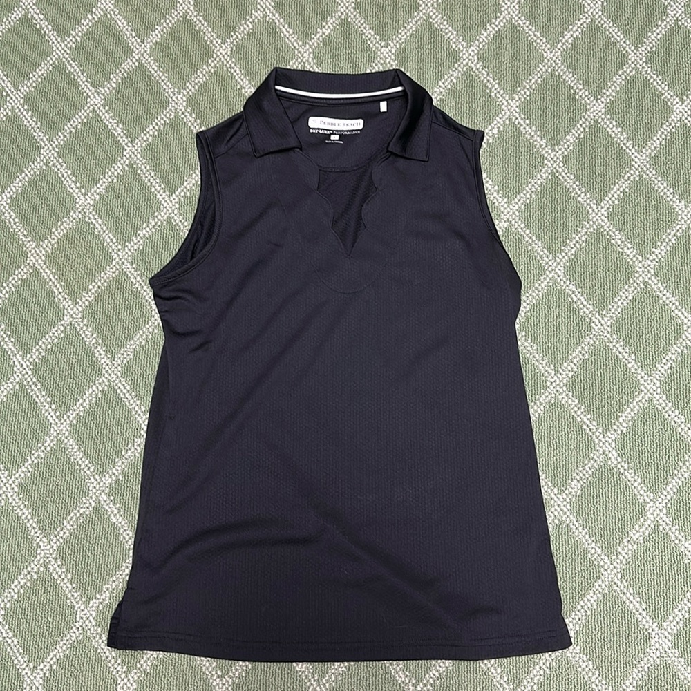 Ladies performance top with pretty scalloped neck.